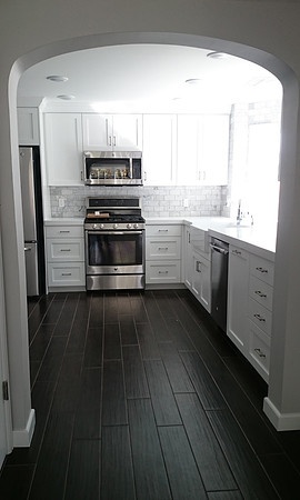 White kitchen with carrera tile